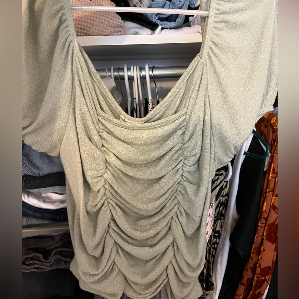 Sage green ruffles top